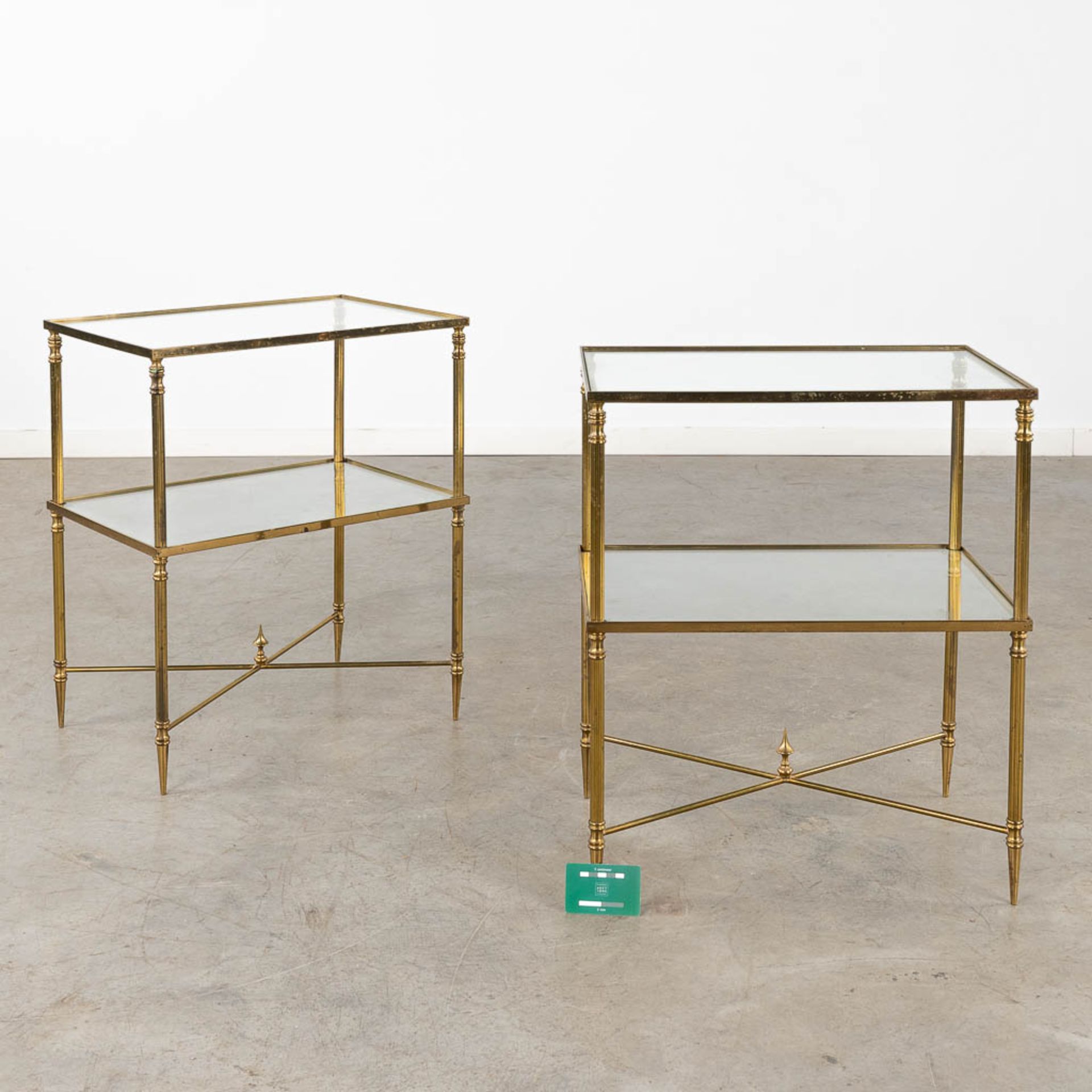 A pair of two-tier side tables, brass and glass in the style of Maison Jansen. (D:35 x W:50 x H:60 c - Image 2 of 10