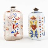 Two antique enamel hand-painted glass bottles, 17th/18th C. (H:13 cm)