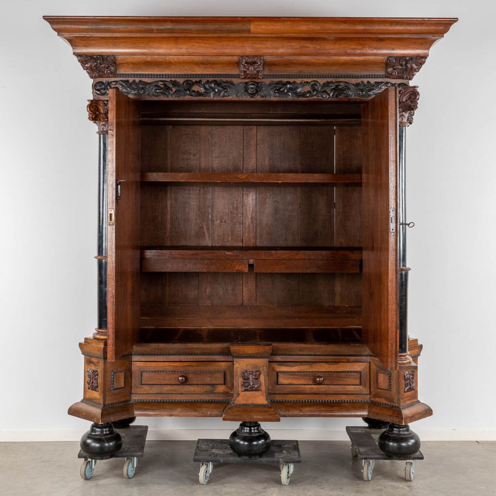 An antique Dutch two door 'Kapiteelkast', wood sculptures, oak and ebony. 18th C. (D:93 x W:223 x H: - Image 6 of 26