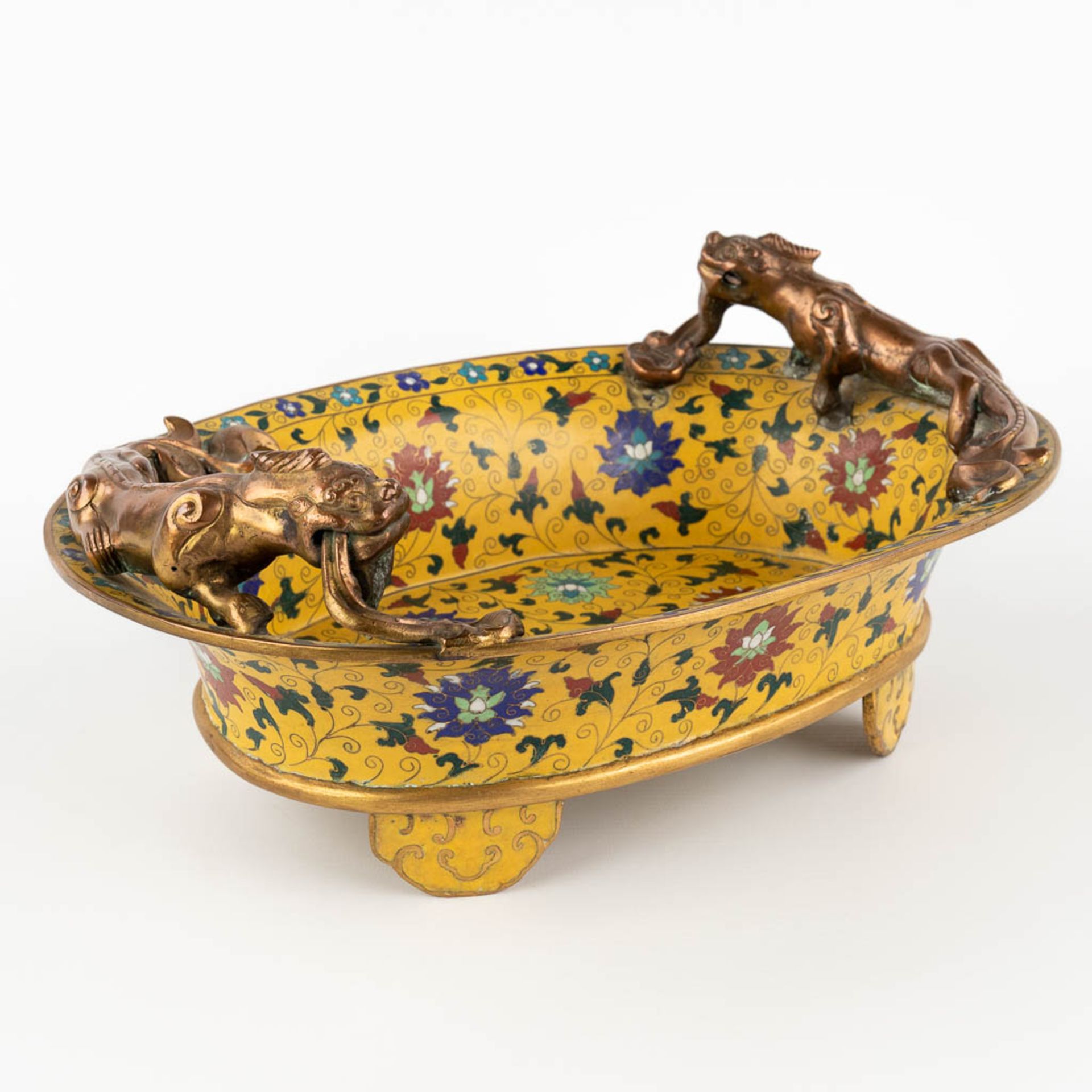 A Chinese cloisonné bronze bowl, mounted with dragons and finished with floral decor. (D:25,5 x W:36 - Image 3 of 13