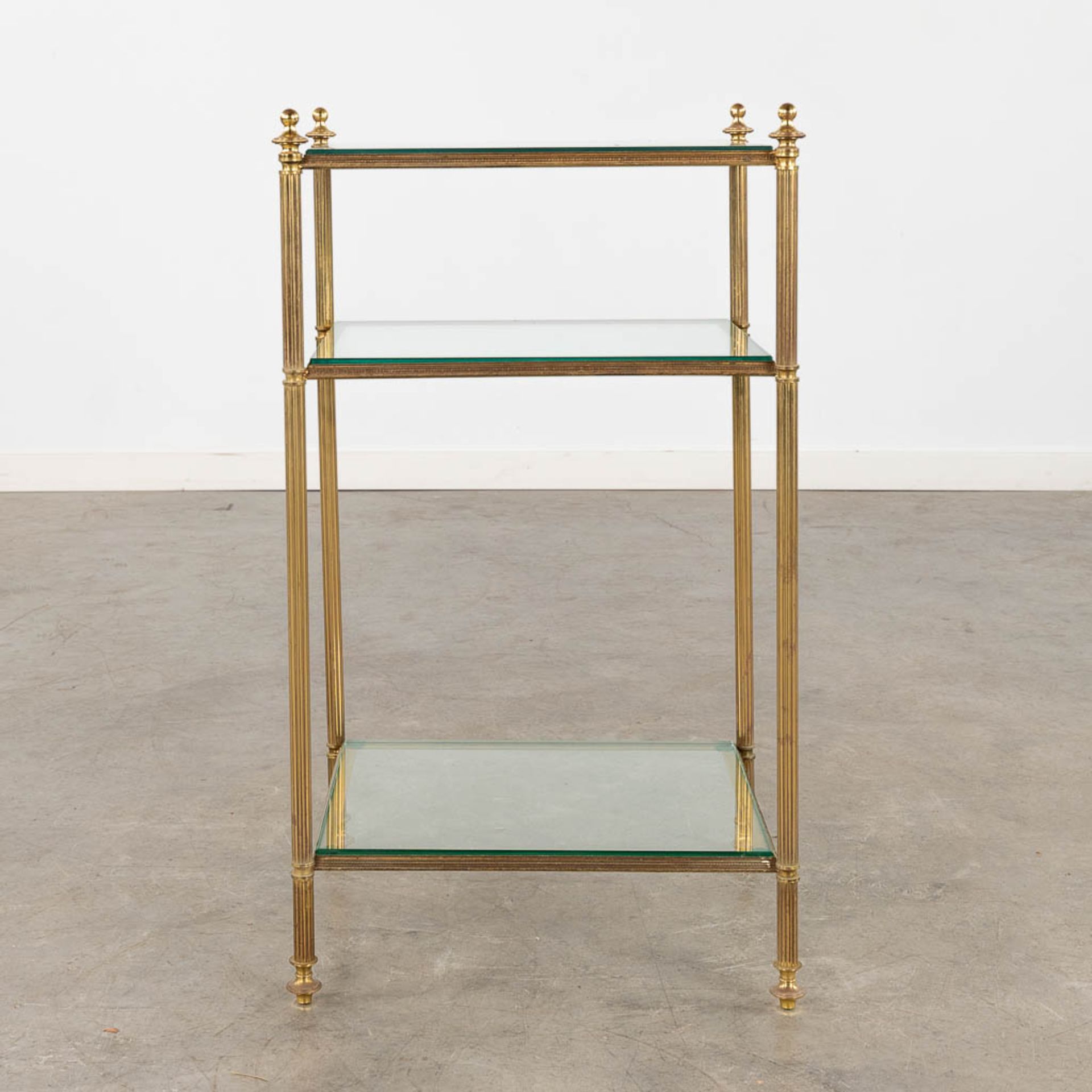 A two-tier side table, brass and glass in the style of Maison Jansen. (D:32 x W:40 x H:70 cm) - Image 3 of 9