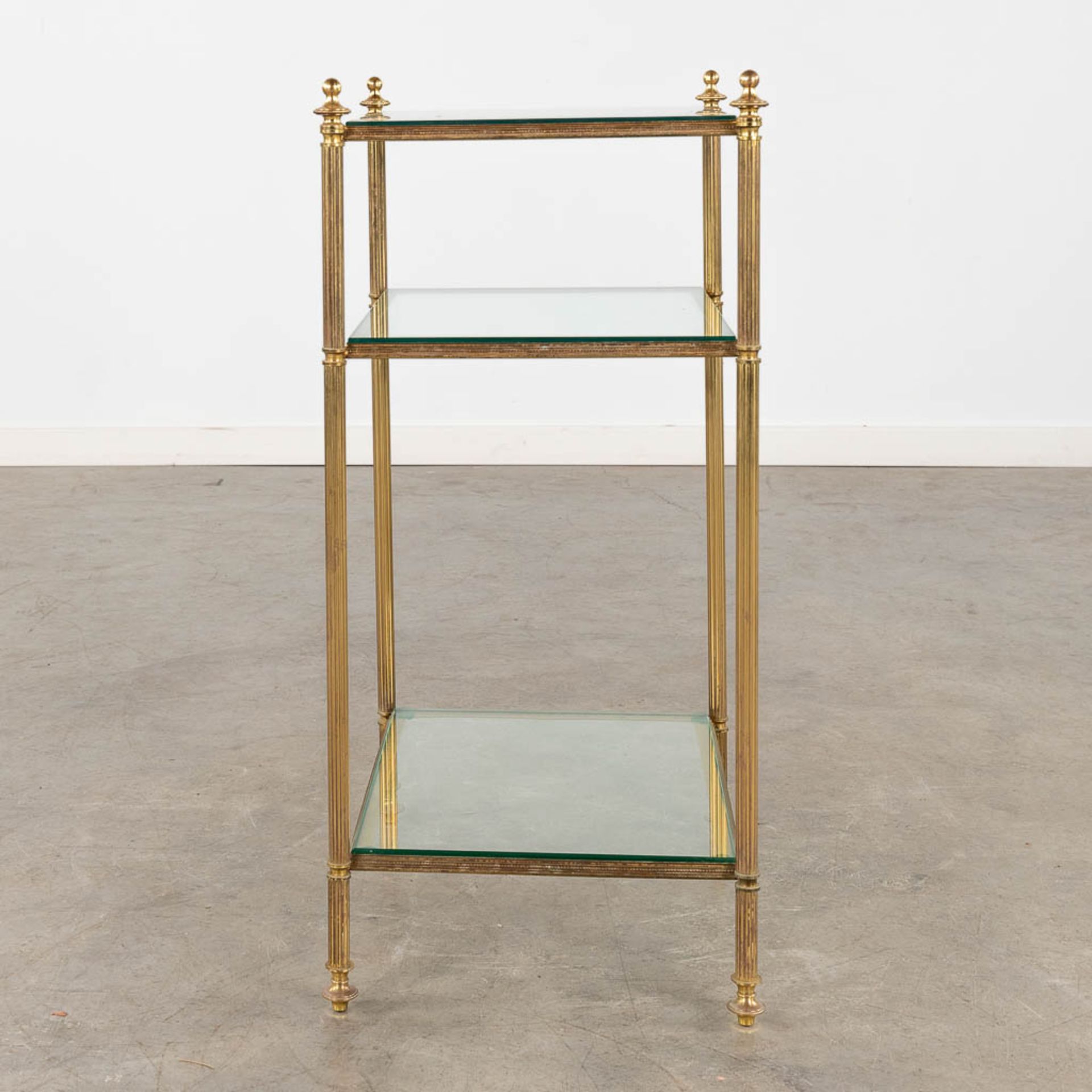 A two-tier side table, brass and glass in the style of Maison Jansen. (D:32 x W:40 x H:70 cm) - Image 4 of 9