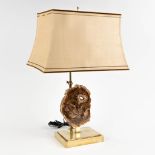 A table lamp with a fossilized tree trunk, circa 1980. (H:57 cm)