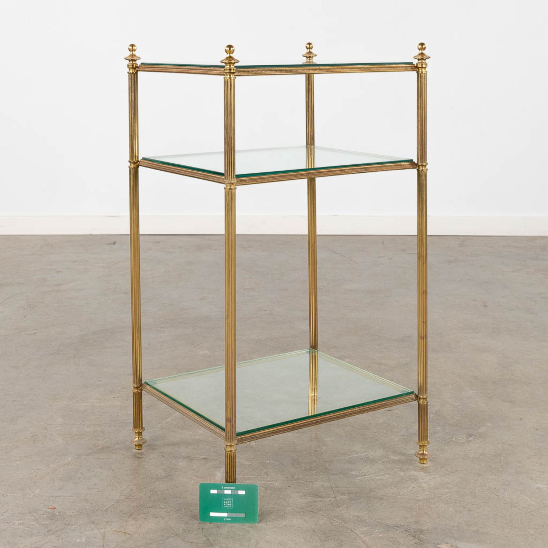 A two-tier side table, brass and glass in the style of Maison Jansen. (D:32 x W:40 x H:70 cm) - Image 2 of 9