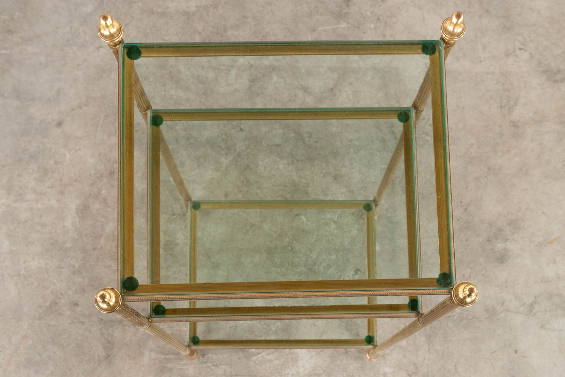 A two-tier side table, brass and glass in the style of Maison Jansen. (D:32 x W:40 x H:70 cm) - Image 7 of 9