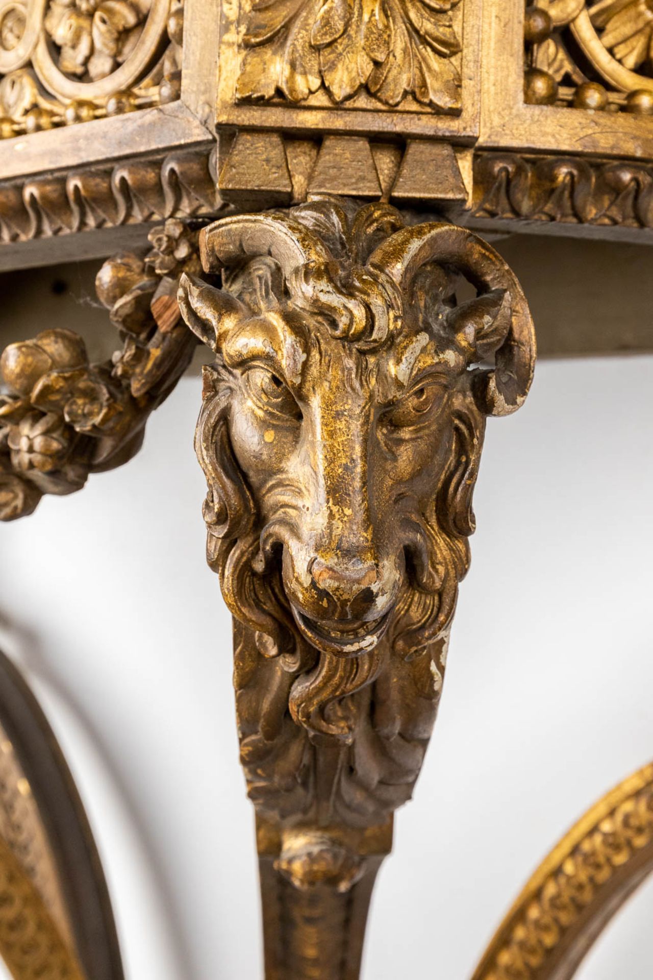 A console table with ram's heads, gilt and sculptured wood and a Carrara marble top. 19th C. (D:41 x - Image 11 of 15