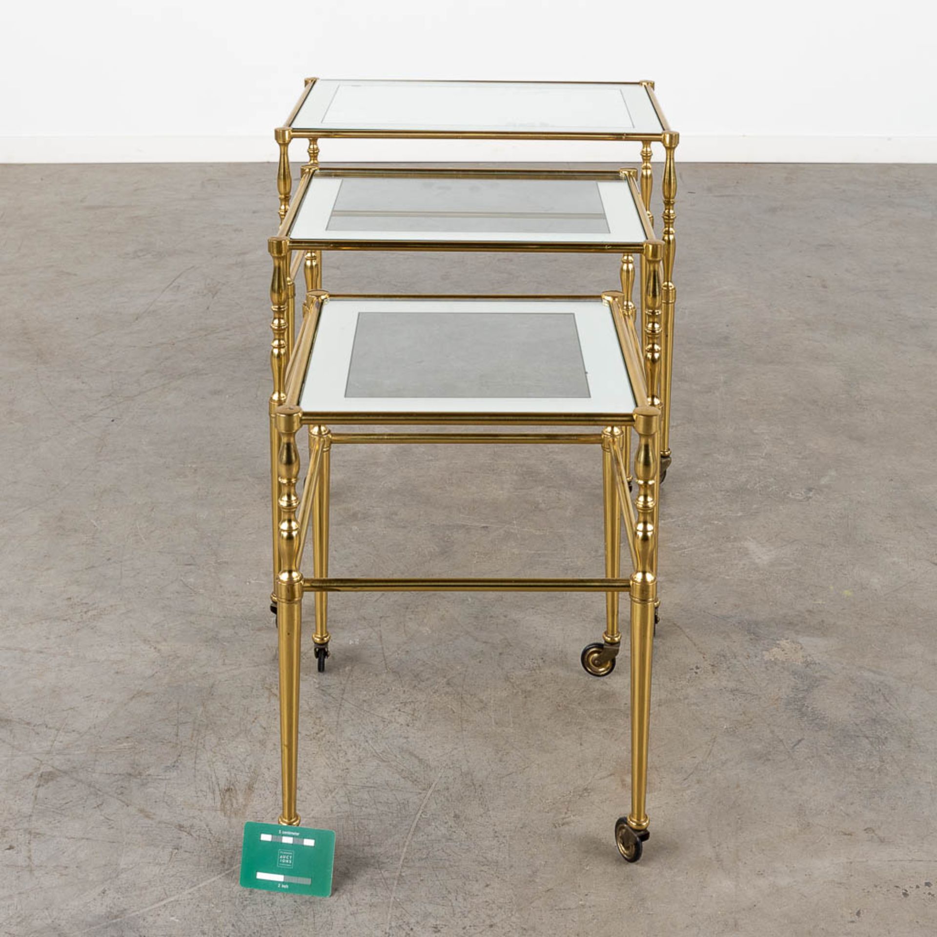 A set of nesting tables, brass and glass. 20th C. (D:39 x W:56 x H:52 cm) - Image 2 of 11