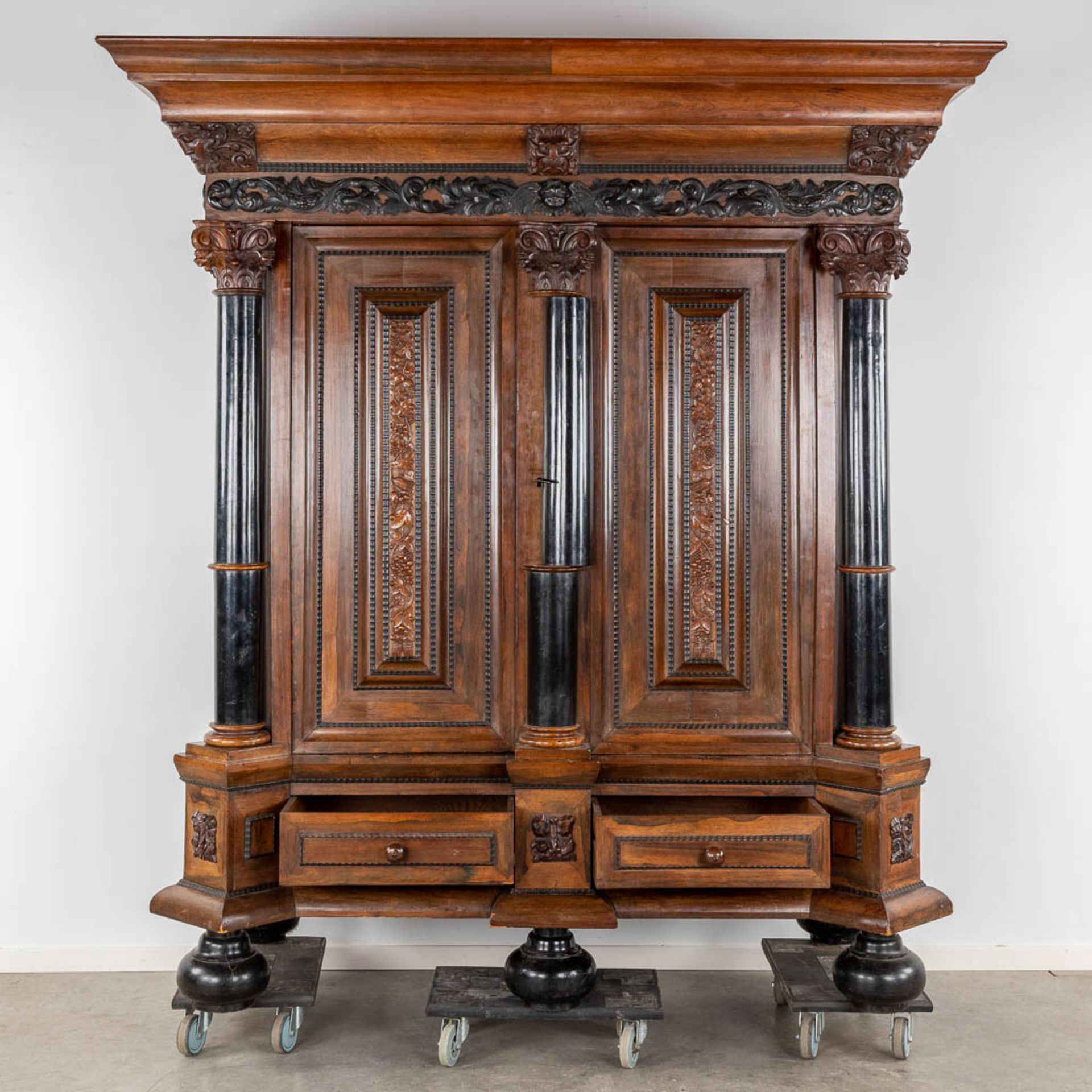 An antique Dutch two door 'Kapiteelkast', wood sculptures, oak and ebony. 18th C. (D:93 x W:223 x H: - Image 5 of 26