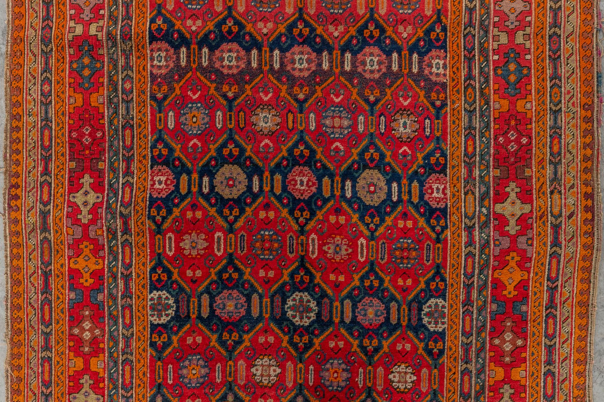 An Oriental hand-made carpet, Karabach (D:290 x W:128 cm) - Image 4 of 8