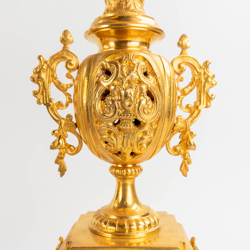 A three-piece mantle garniture clock and candelabra, gilt bronze in Louis XV style. 19th C. (D:28 x - Image 10 of 16