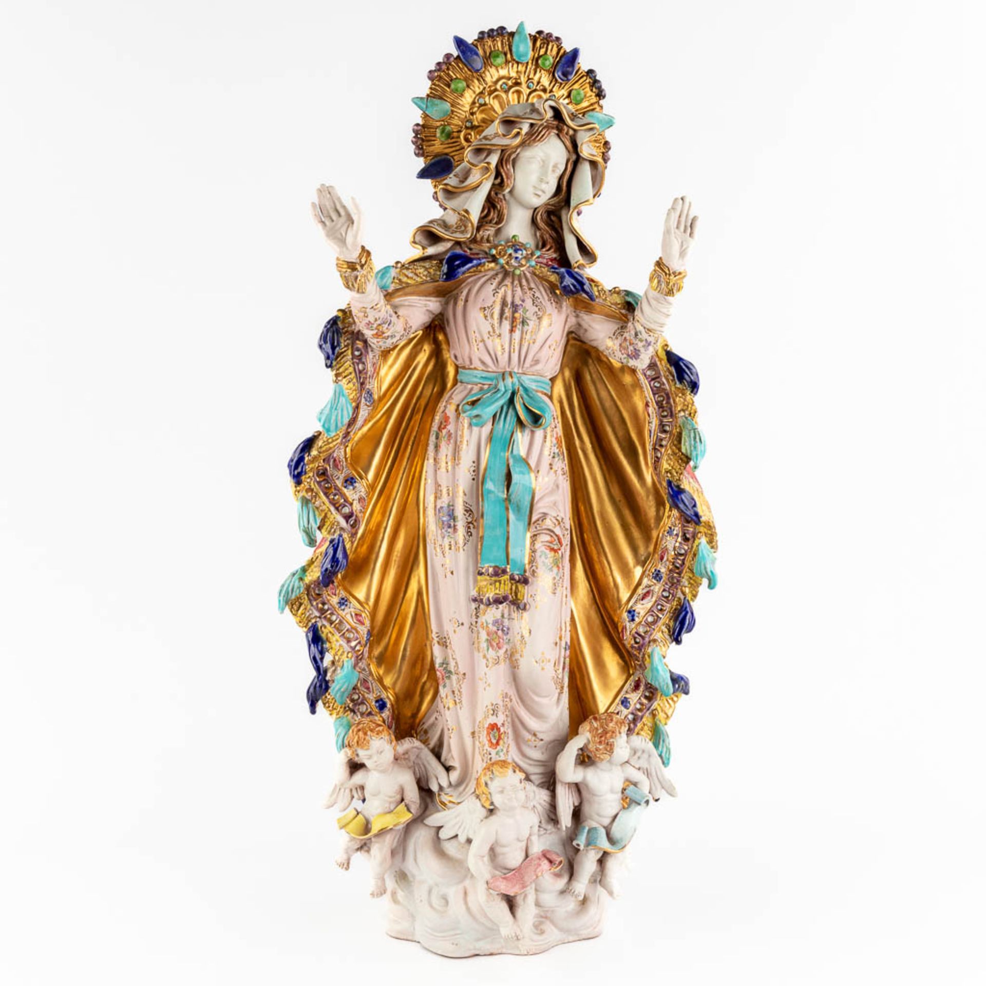 Paolo MARIONI (XX) A large polychrome terracotta figurine of Madonna with children, 20th C. (D:18 x