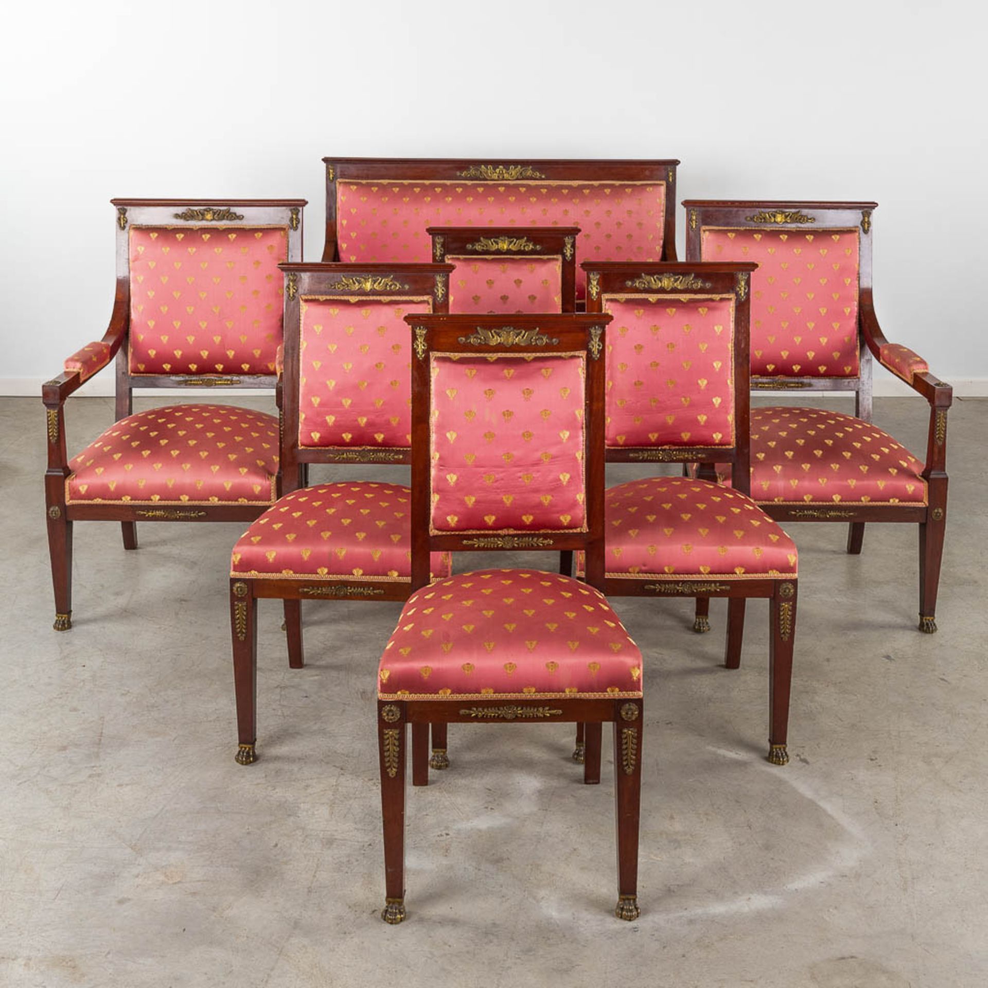 A fine 7-piece salon suite, Empire style, mahogany mounted with bronze. (D:60 x W:130 x H:100 cm)