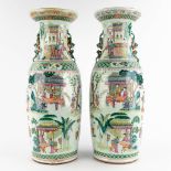 A pair of Chinese Famille Verte vases decorated with workers in the garden. 19th C. (H:59 x D:21 cm)