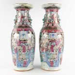 A pair of Chinese vases with Famille Rose vases with a temple scène, 19th C. (H:61 x D:23 cm)