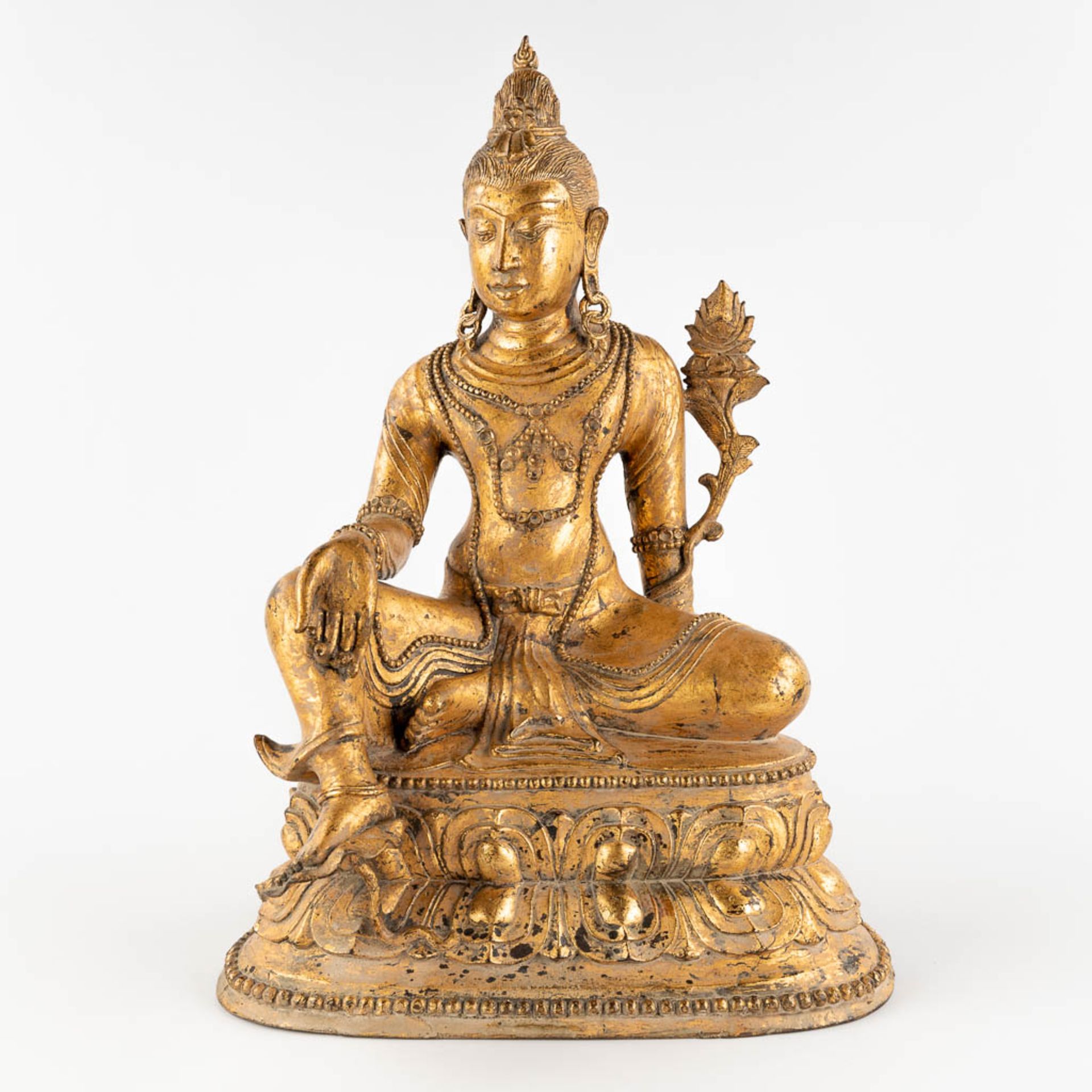 A sculpture of 'Green Tara', gilt bronze, 19th/20th C. (W:34 x H:49 cm)