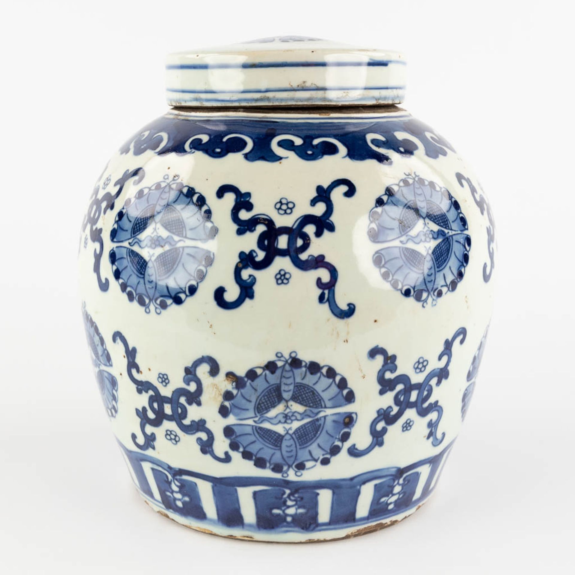 A Chinese ginger jar, decorated with butterflies, export porcelain for the Middle Eastern market. 19