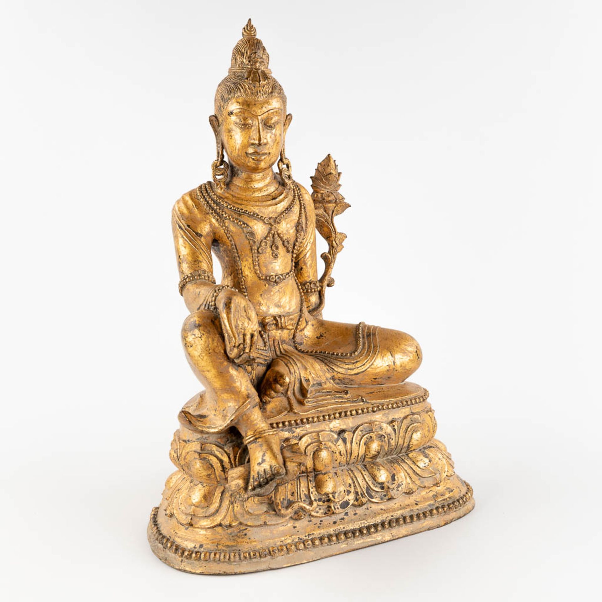 A sculpture of 'Green Tara', gilt bronze, 19th/20th C. (W:34 x H:49 cm) - Image 3 of 13