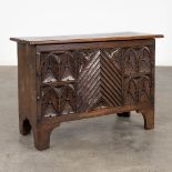 An chest, sculptured panels in a Gothic-revival inspired style. 20th C. (D:35 x W:82 x H:55 cm)