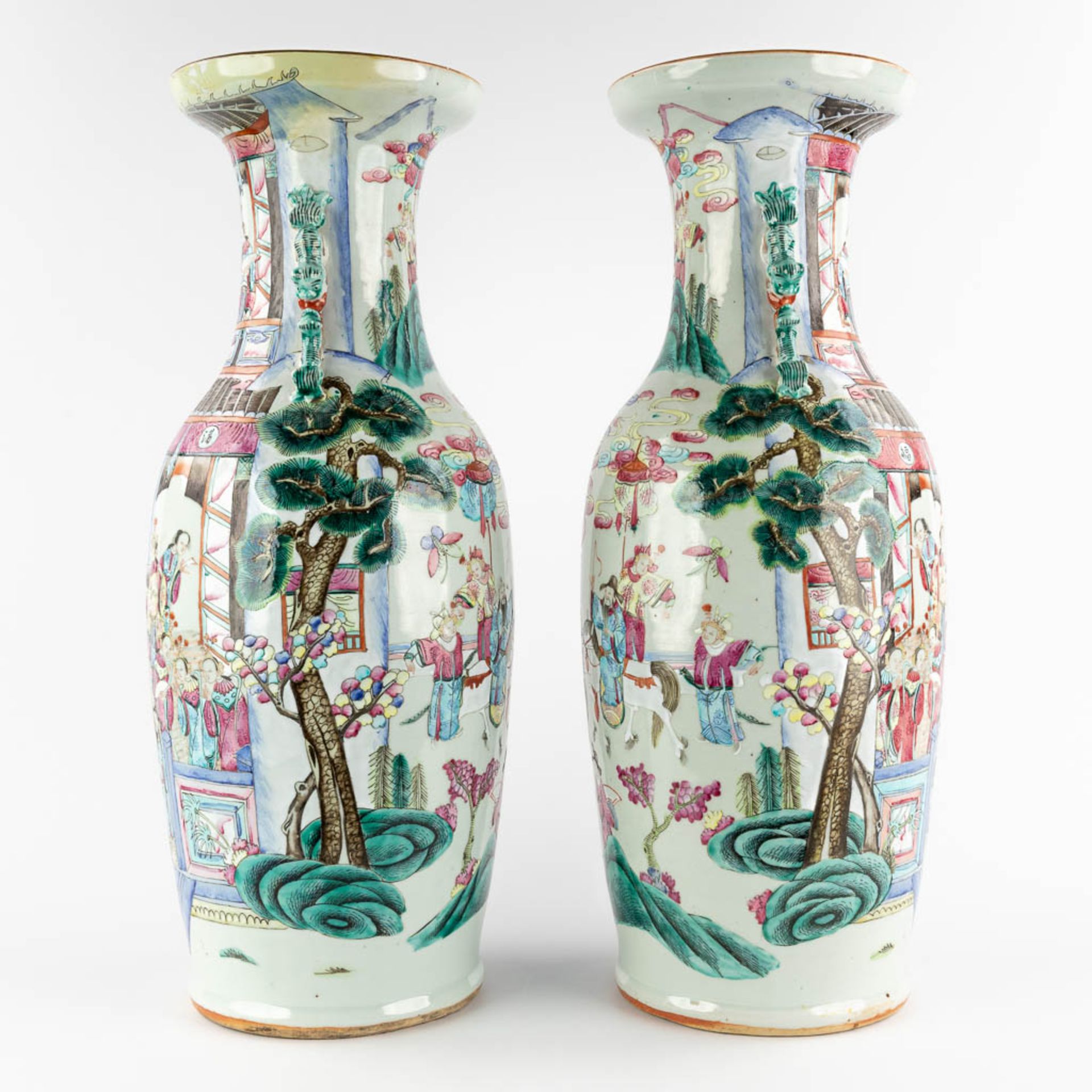 A pair of Chinese vases with Famille Rose vases with a temple scène, 19th C. (H:61 x D:23 cm) - Image 3 of 12