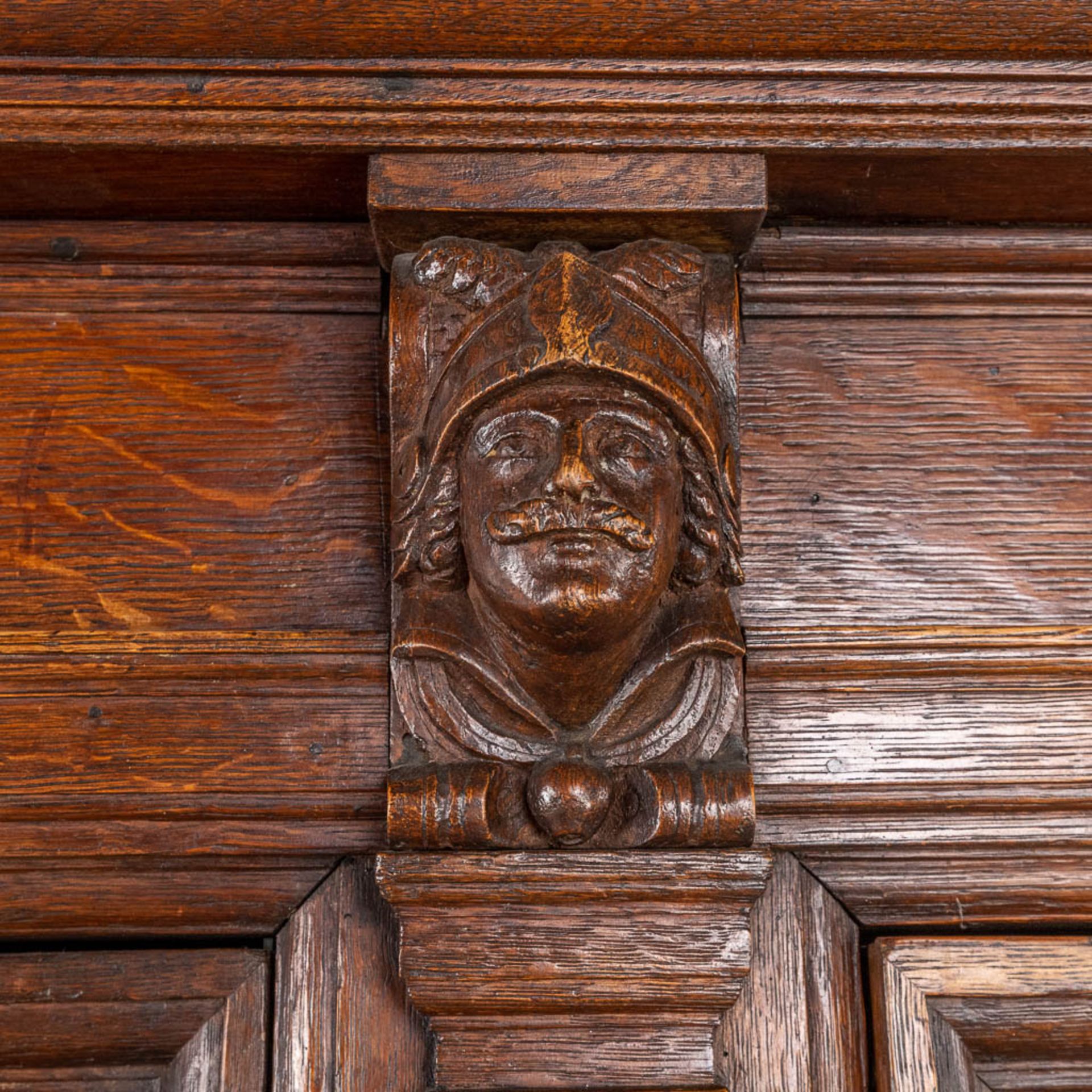 An antique four door cabinet, sculptured oak. 18th C. (D:76 x W:186 x H:216 cm) - Image 11 of 20