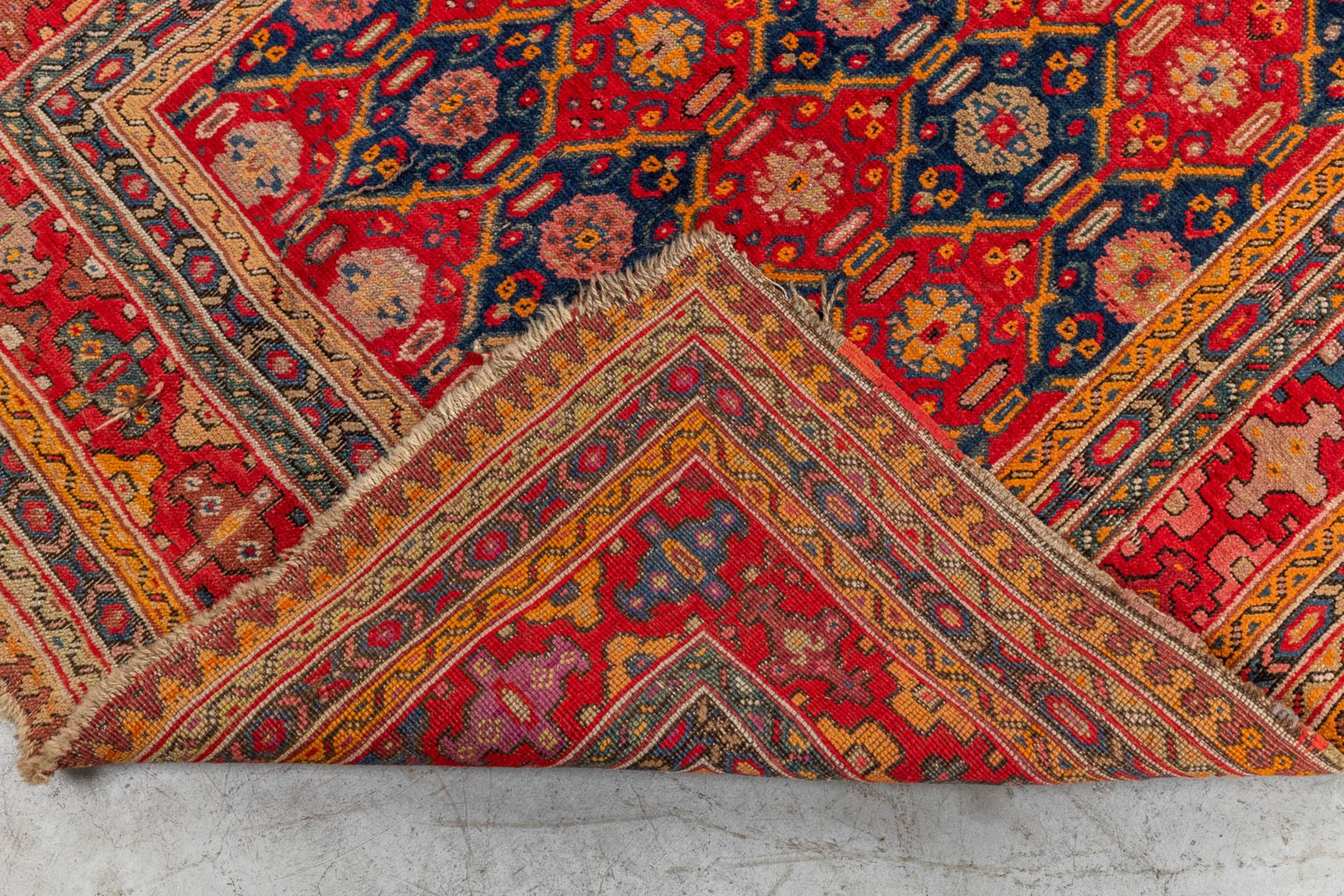 An Oriental hand-made carpet, Karabach (D:290 x W:128 cm) - Image 8 of 8