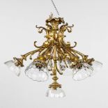 A ceiling lamp or Chandelier, bronze with cut crystal and 7 points of light. Circa 1900. (H:46 x D:5