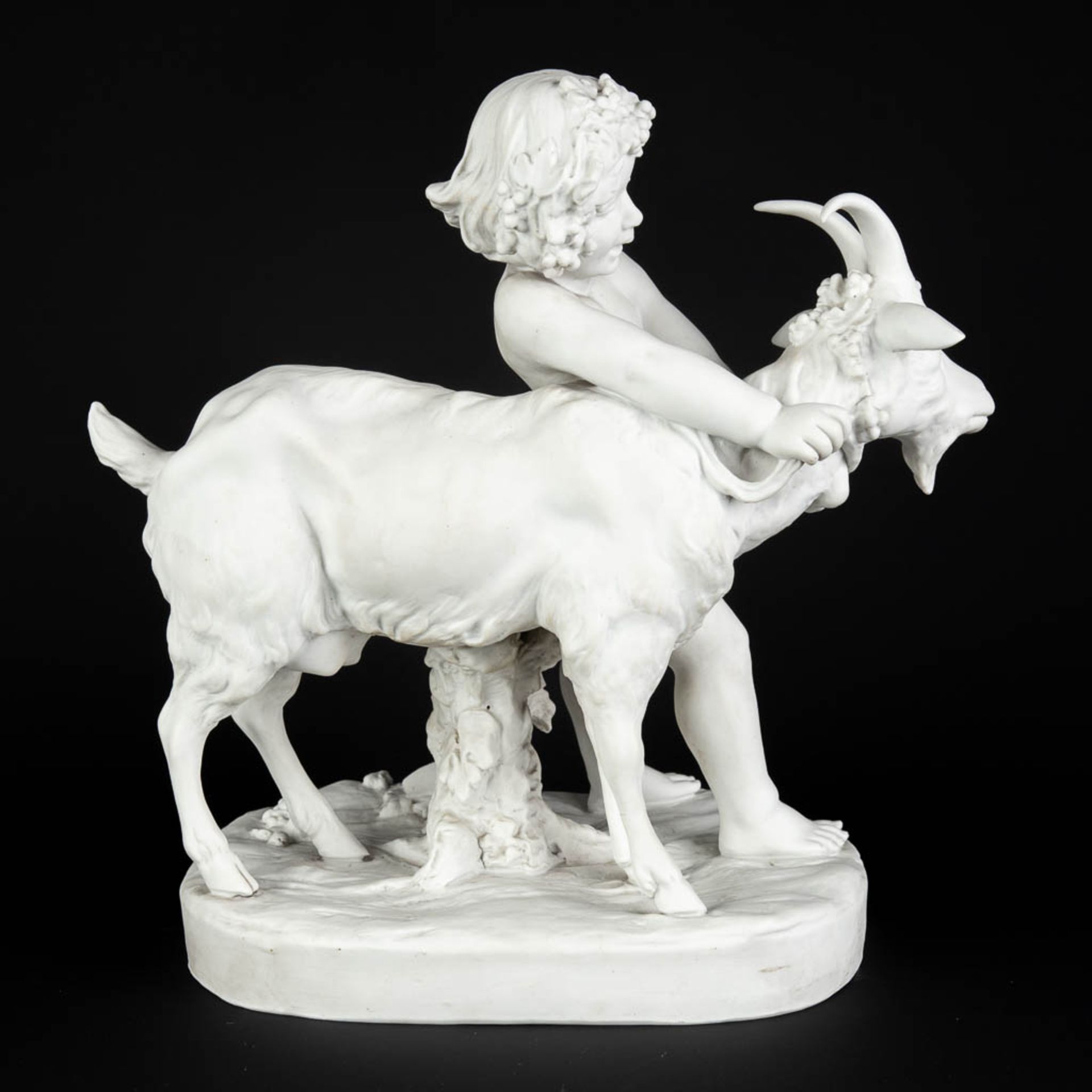 FAGOTTO (XIX-XX) 'Child with a ram' Bisque porcelain, marked Sèvres, Paris. (D:19 x W:33 x H:32 cm) - Image 6 of 12