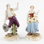 A pair of polychrome porcelain figurines, 'The Dance'. 19th C. (W:22 x H:24 cm)