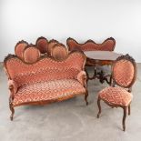 An antique salon suite, mahogany in Louis Philippe style, 2 sofa's, 6 chairs and a table. (D:73 x W: