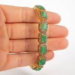 A bracelet, gilt silver with natural emeralds and old cut diamonds. 25,83g. (D:18 cm)