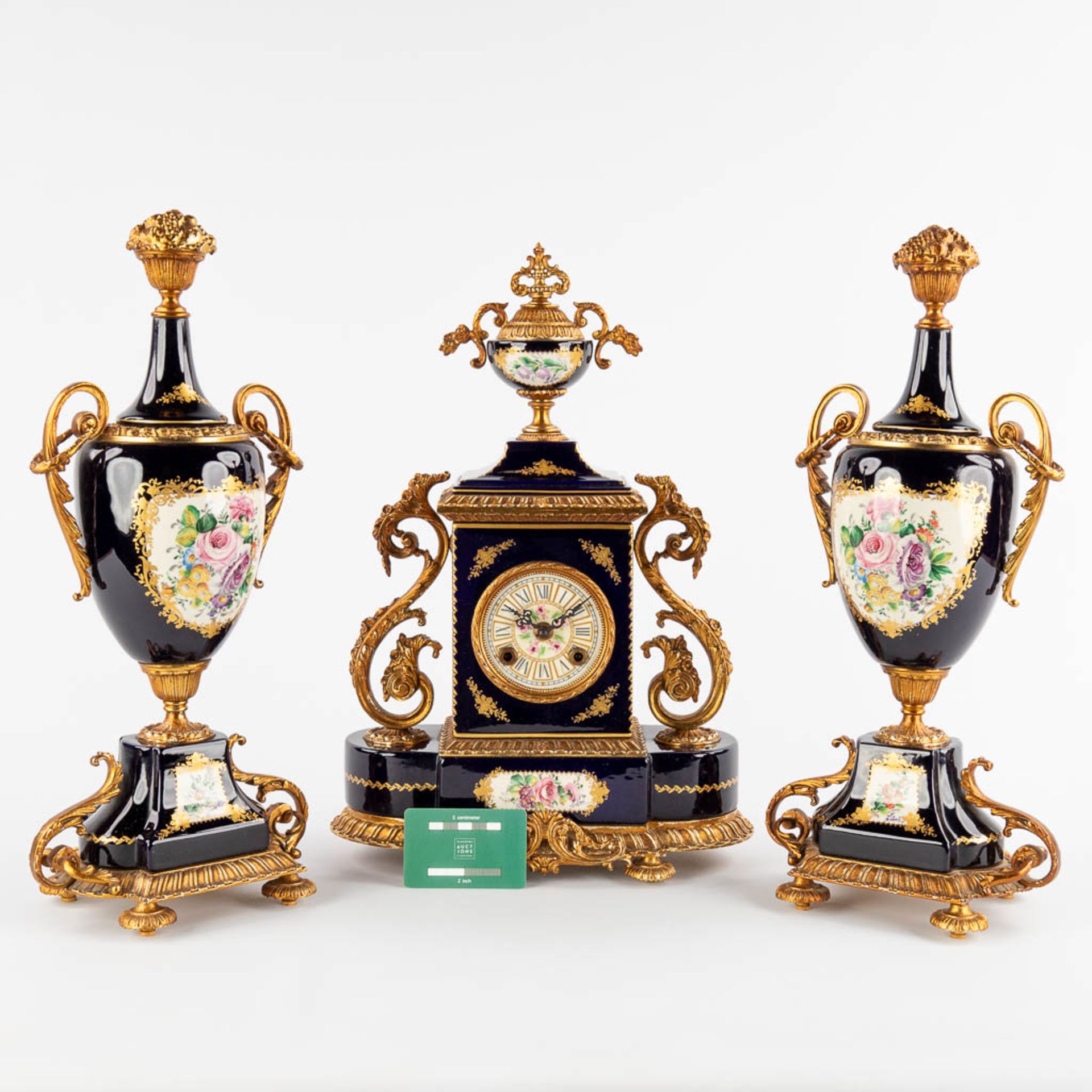 A.C.F. A three-piece mantle garniture clock and side pieces, cobalt blue porcelain mounted with bron - Image 2 of 14