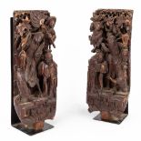 A pair of decorative and Oriental wood-sculptured panels. 19th C. (D:18 x W:26 x H:76 cm)