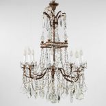 A large and antique chandelier, brass mounted with glass. France, Circa 1900. (W:77 x H:100 cm)
