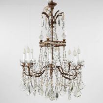 A large and antique chandelier, brass mounted with glass. France, Circa 1900. (W:77 x H:100 cm)