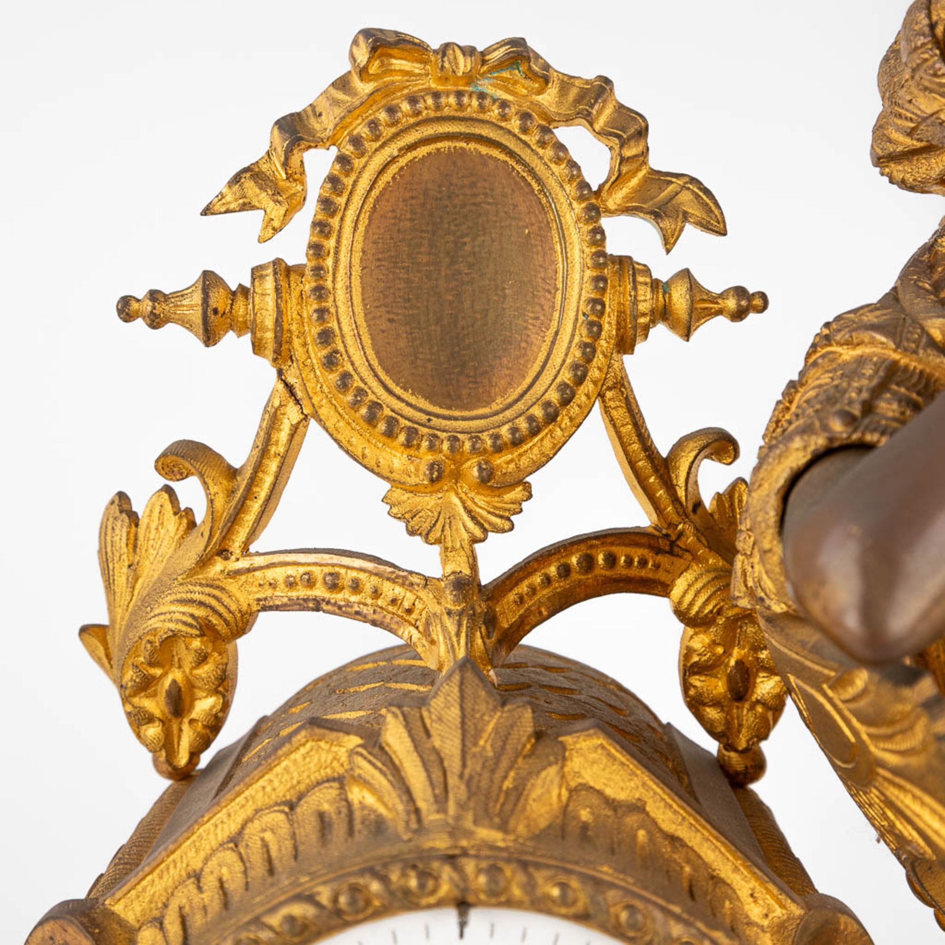 A mantle garniture clock, gilt bronze decorated with a Lady in a sofa. Late 19th C. (D:18 x W:56 x H - Image 9 of 14