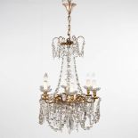 A large chandelier, bronze mounted with glass. (H:80 x D:56 cm)
