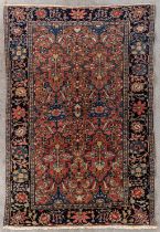 An Oriental hand-made carpet. (D:146 x W:101 cm)