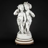 Volksted Rudolstadt, 'The Infant Bacchus and a Putti', bisque porcelain. 20th C. (H:61 x D:29 cm)