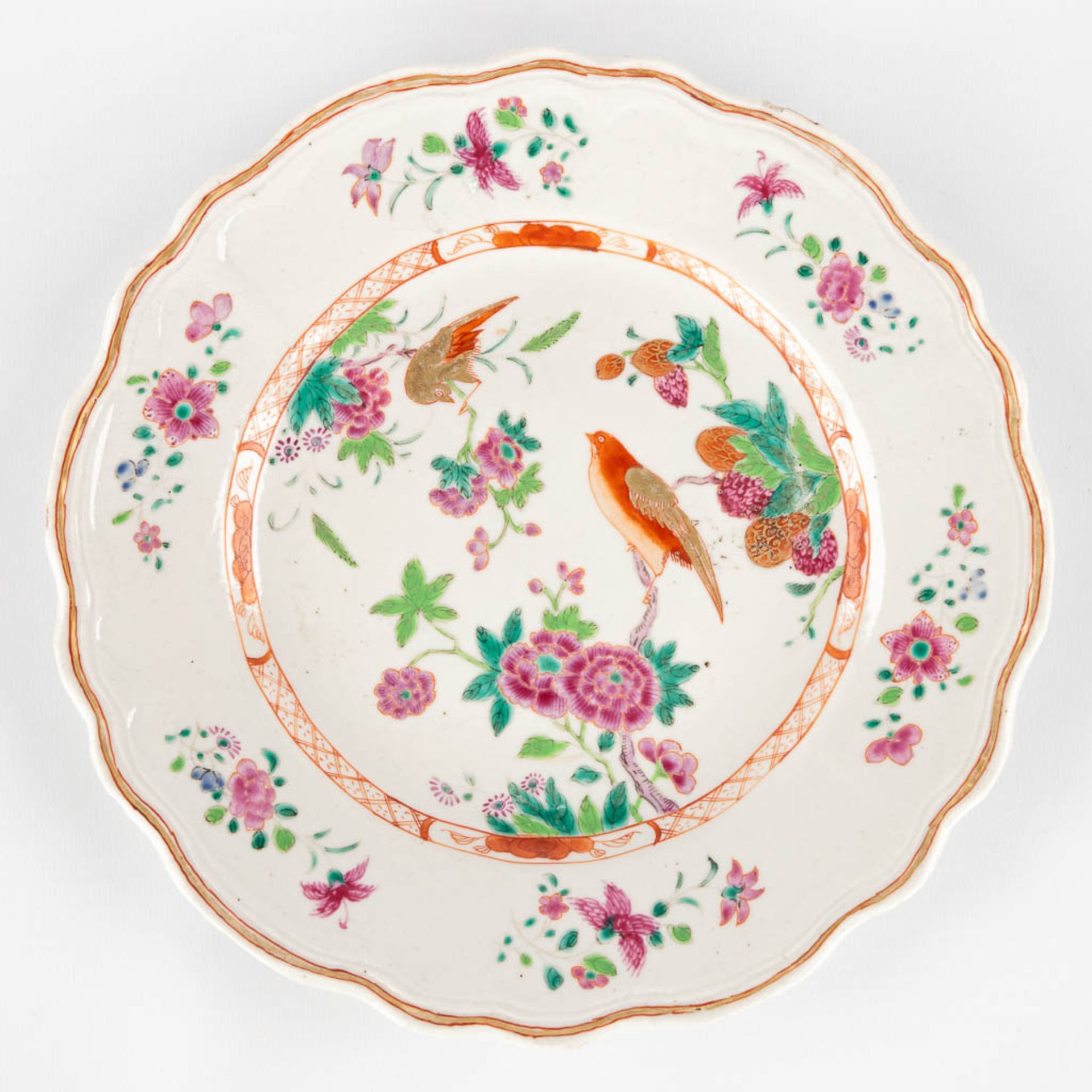 Three Chinese Famille Rose plates, decorated with fauna and flora. 19th/20th C. (D:23,5 cm) - Image 3 of 9