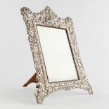 A picture frame with silver frame, finely chiselled. (W:32,5 x H:42 cm)