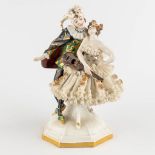 A polychrome porcelain group 'Dancing with a Jester', probably Italy. (H:12 x D:20 cm)