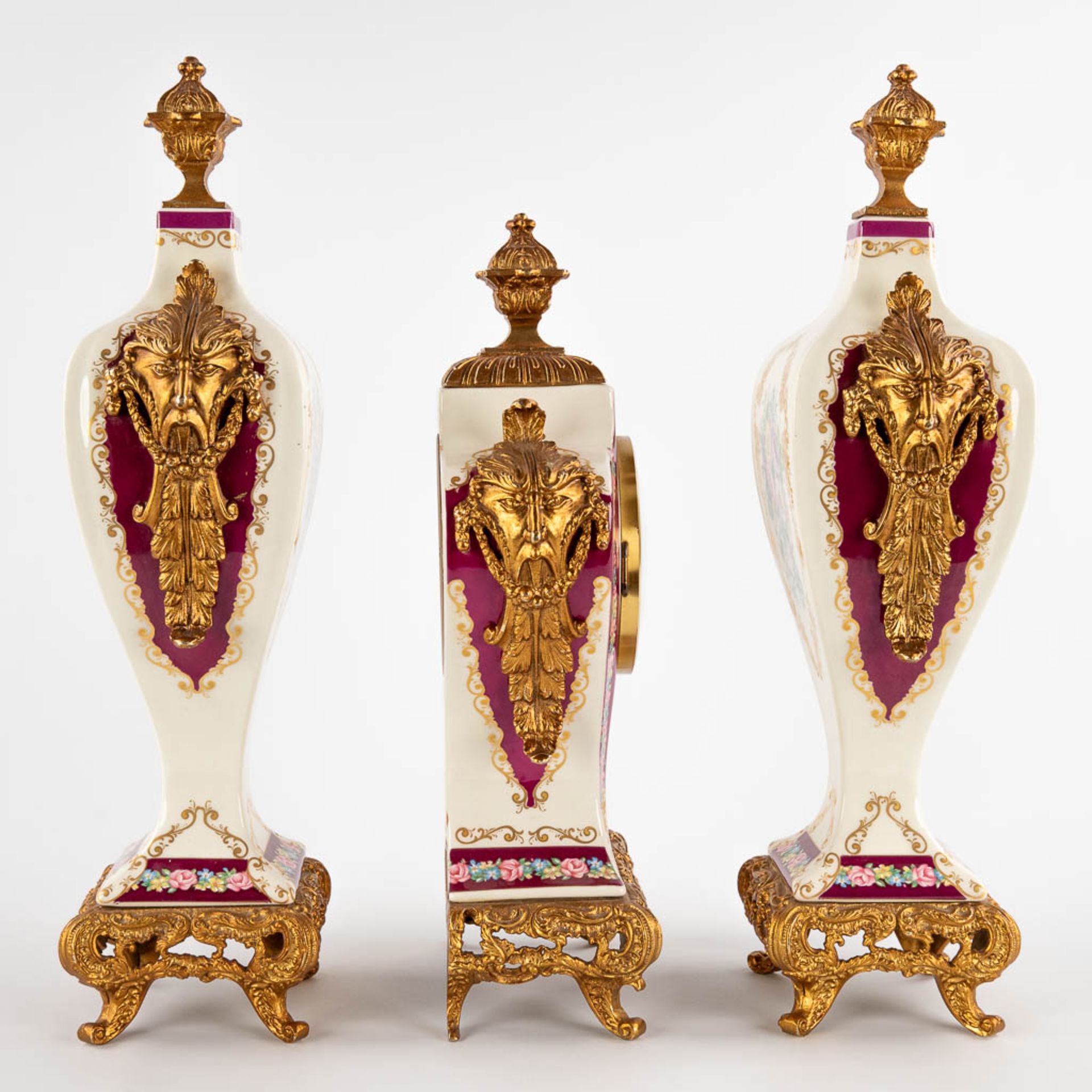 A three-piece mantle garniture clock and side pieces, porcelain mounted with bronze and floral decor - Image 4 of 14
