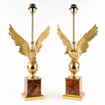 A pair of table lamps with an eagle figurine. Hollywood Regency style. 20th C. (D:15 x W:30 x H:61,5