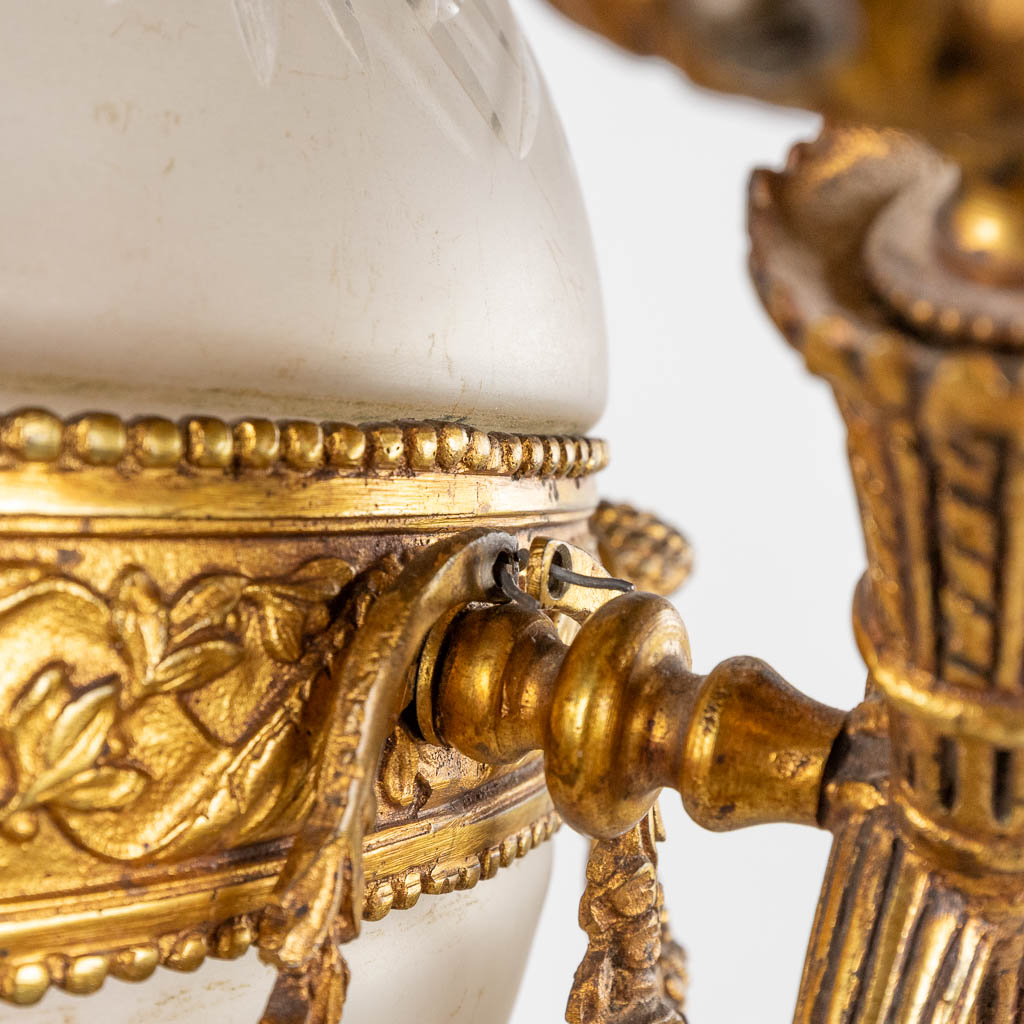 A chandelier, bronze mounted with glass and flambeaux and an eagle in Louis XVI style. (H:60 x D:44  - Bild 10 aus 12