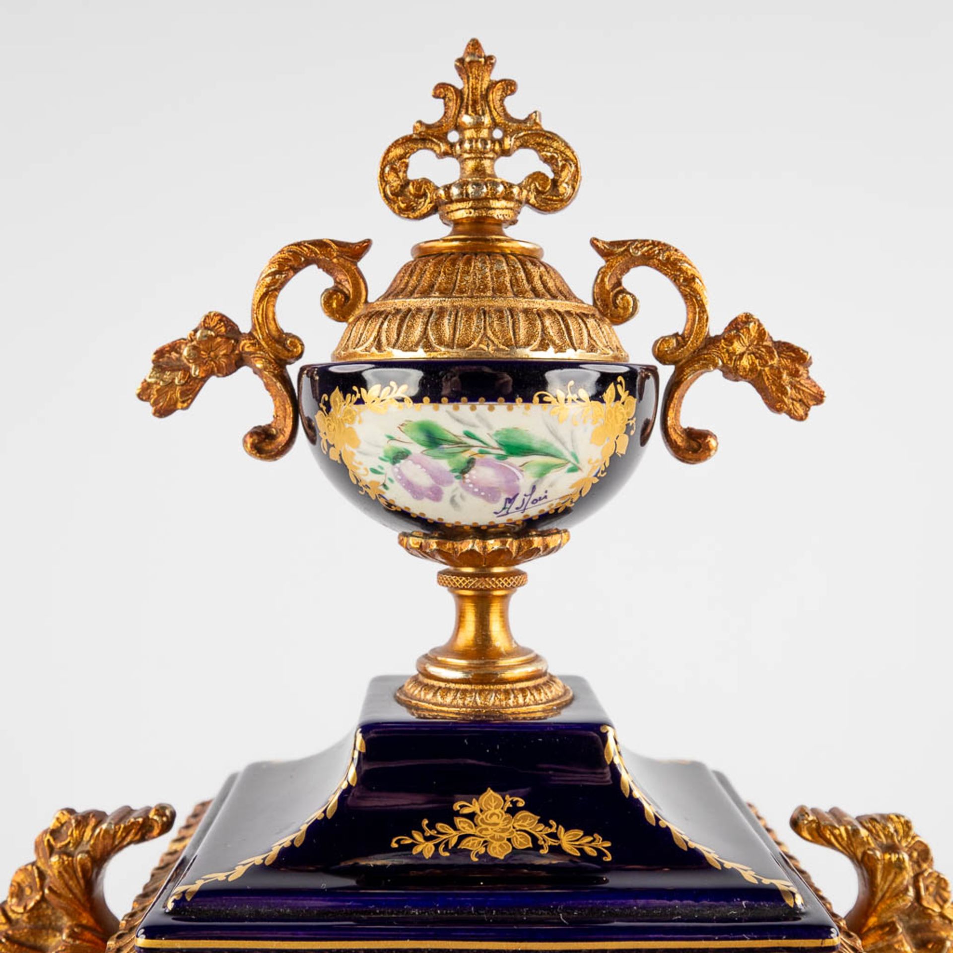 A.C.F. A three-piece mantle garniture clock and side pieces, cobalt blue porcelain mounted with bron - Image 12 of 14