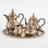 A silver coffee and tea service on the original platter, Germany. 830/1000. 3056g. (D:13 x W:24 x H: