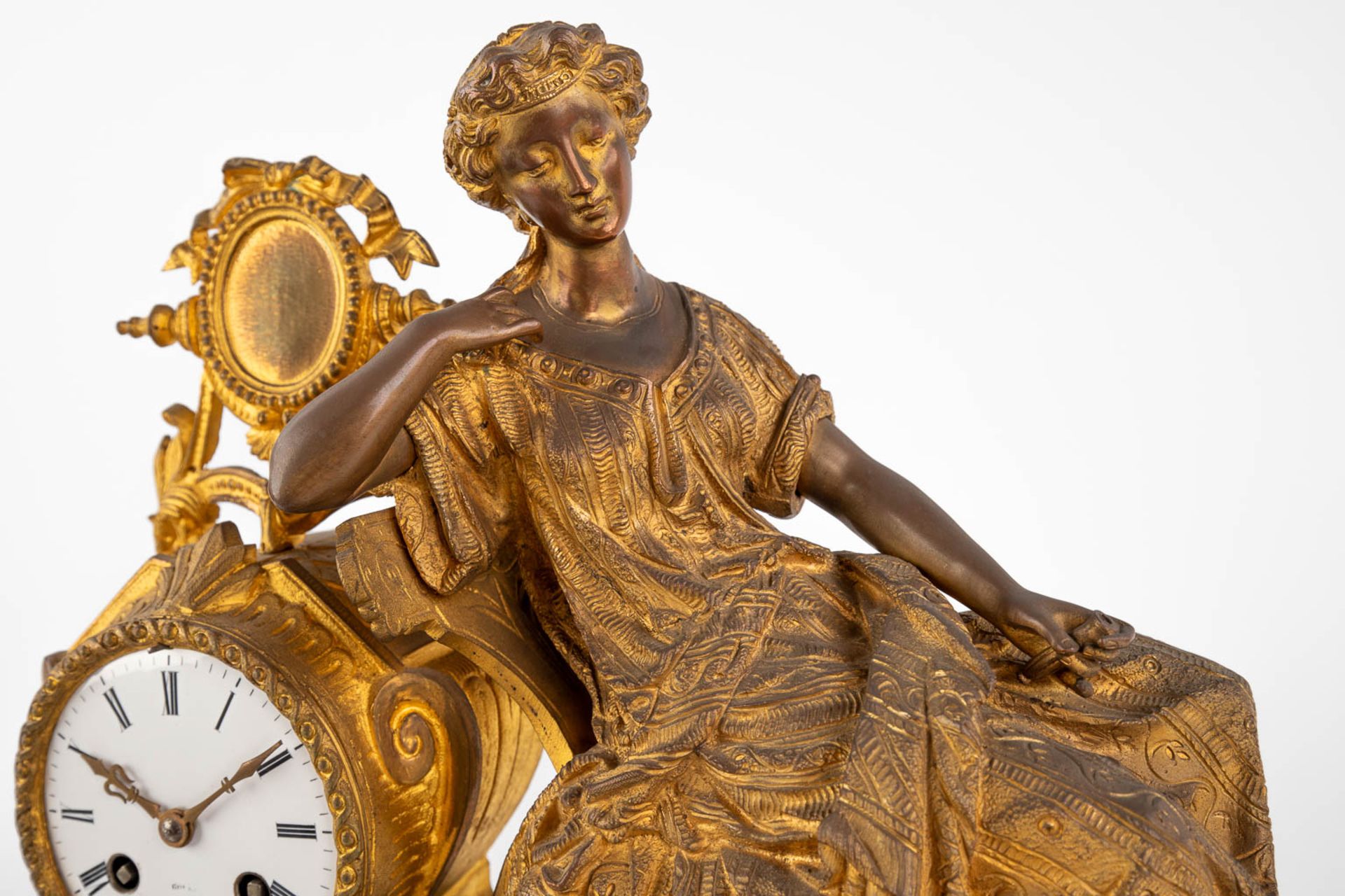 A mantle garniture clock, gilt bronze decorated with a Lady in a sofa. Late 19th C. (D:18 x W:56 x H - Image 10 of 14