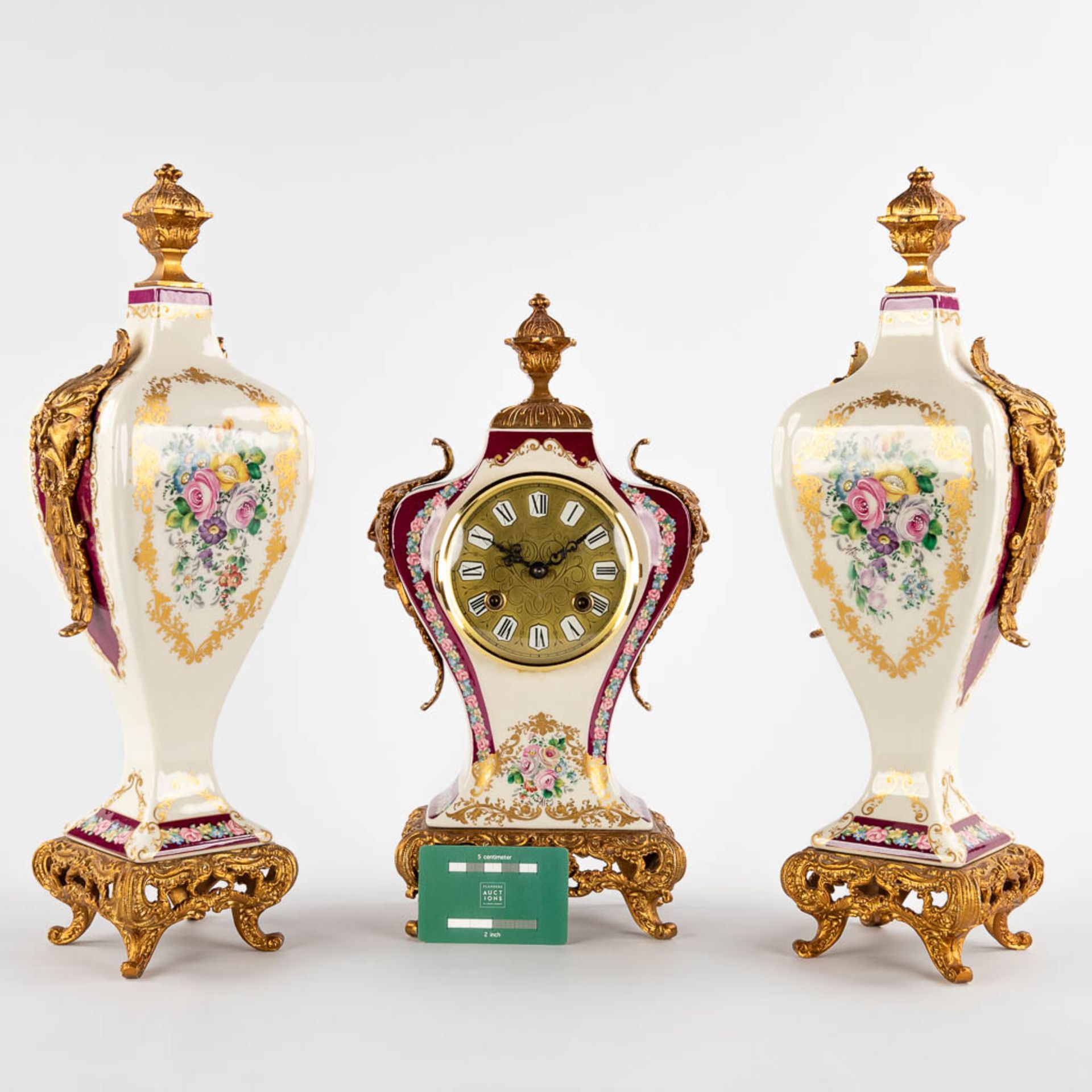 A three-piece mantle garniture clock and side pieces, porcelain mounted with bronze and floral decor - Image 2 of 14