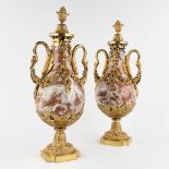 A pair of cassolettes, red and grey marble mounted with bronze in Empire style. (D:18 x W:23 x H:54