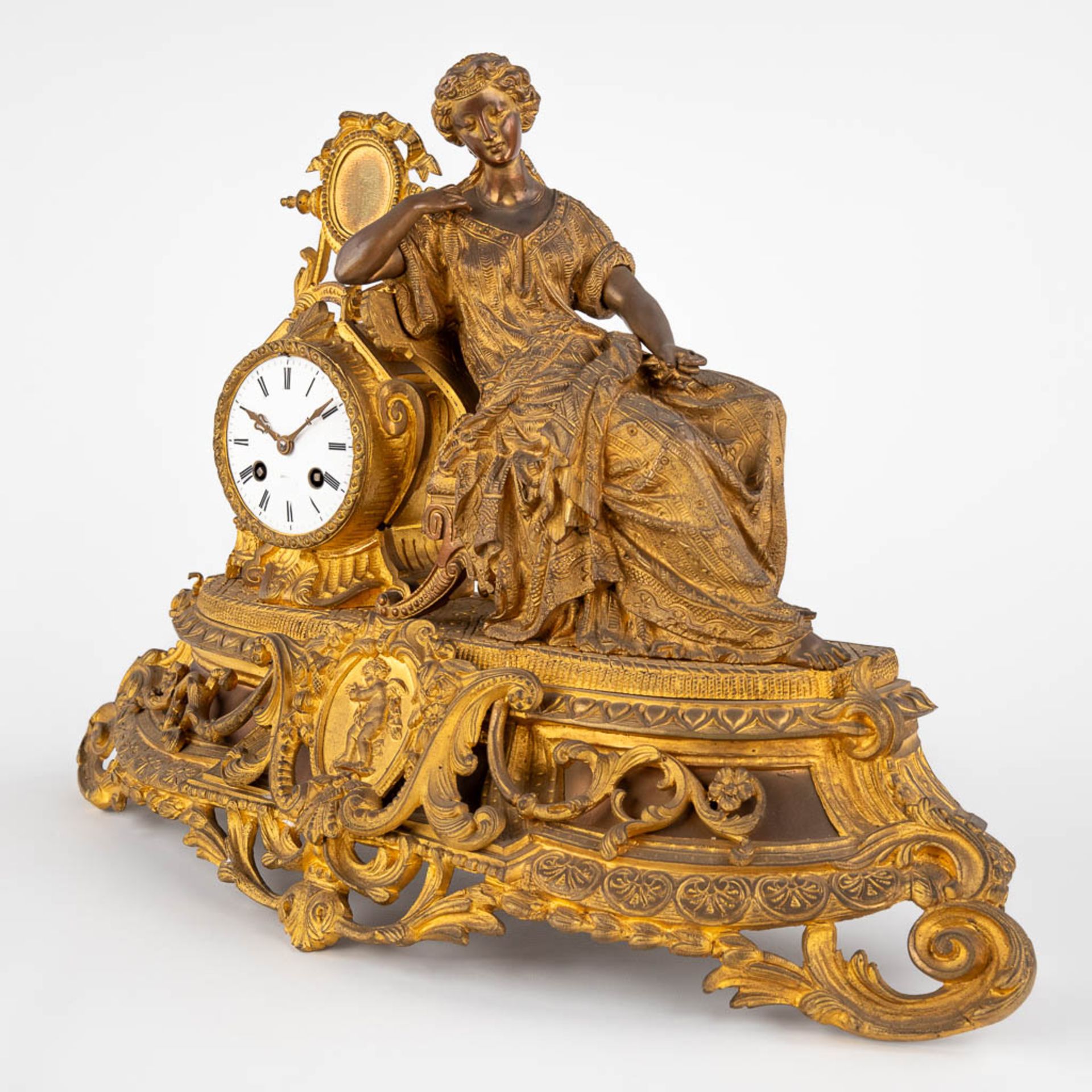 A mantle garniture clock, gilt bronze decorated with a Lady in a sofa. Late 19th C. (D:18 x W:56 x H - Image 4 of 14